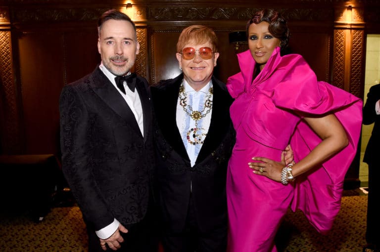 David Furnish, Elton John, and Iman