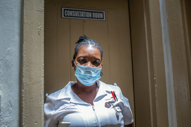 Bridget Kandela, a 34-year-old nurse, stands outside the consultation room at the Men’s Health Clinic in Kabwe.