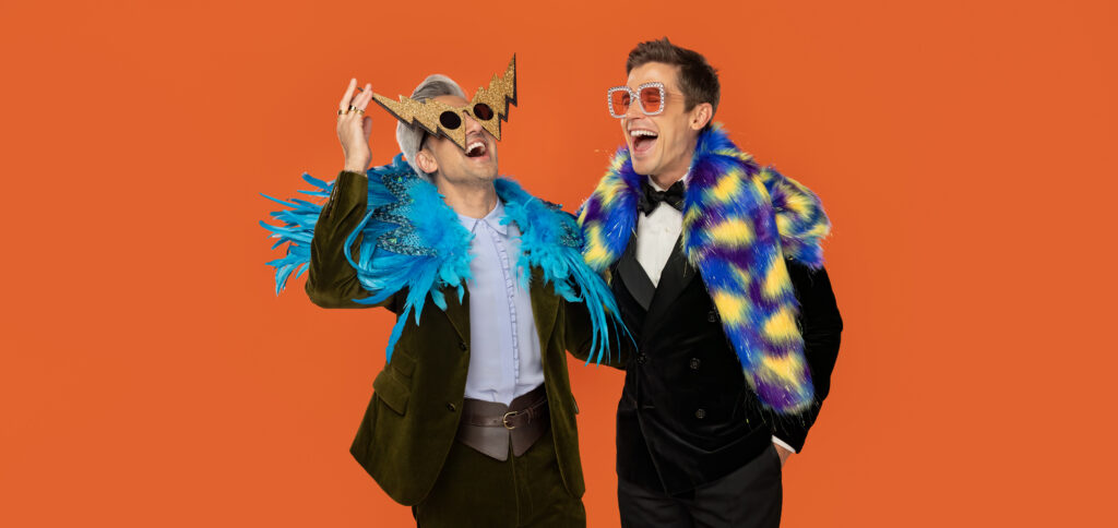 Tan France and Antoni Porowsk letting their inner Elton out in support of the Elton John AIDS Foundation's Rocket Fund