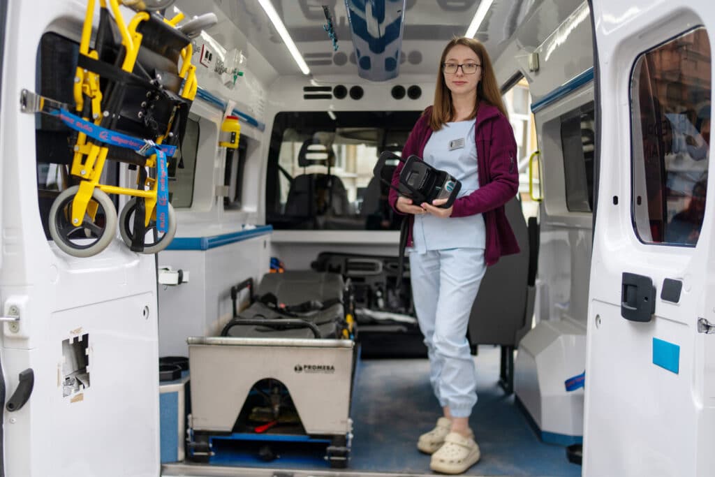 Field doctor shows the inside of TB People Ukraine's mobile clinic van.