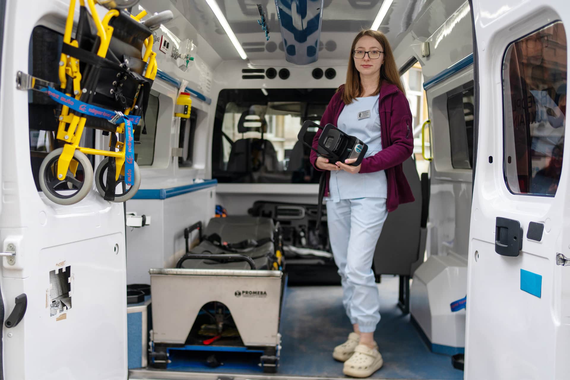 Field doctor shows the inside of TB People Ukraine's mobile clinic van.