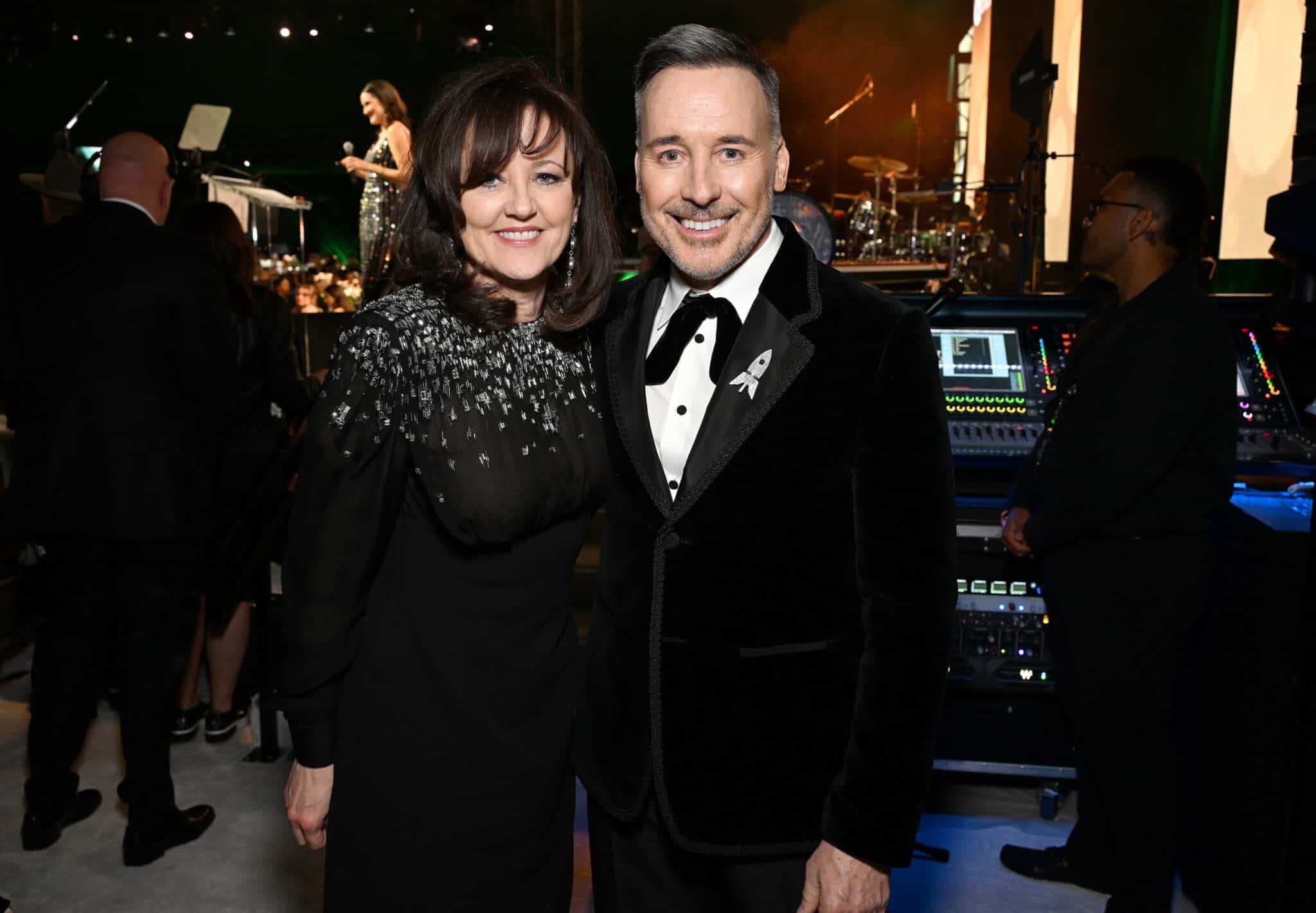 Anne Aslett and David Furnish pose for a photo at the Elton John AIDS Foundation's Academy Awards Viewing Party.